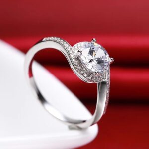 Round-Cut Swirl Halo Engagement Ring