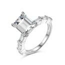 Emerald-Cut Solitaire Ring with Channel-Set Accents