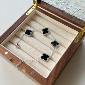 Silver Clover Bracelet with Black Enamel Charms